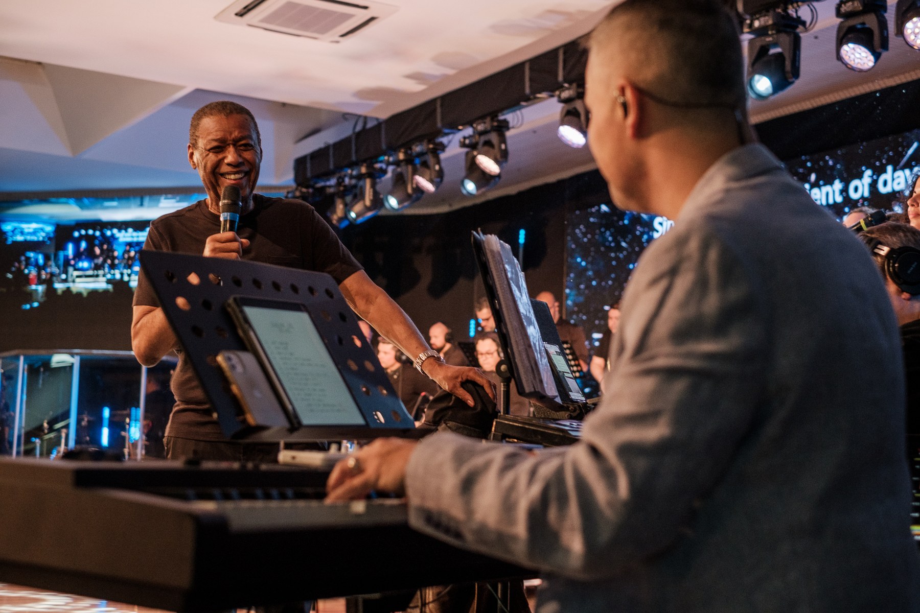 Dr. Ron Kenoly and Bruno Miranda at the keyboard during a worship concert, May 2024